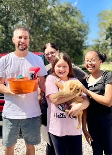 Red Collar puppy and Kaci