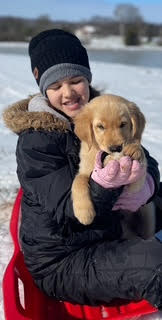 A photo of a different puppy and the brooks family